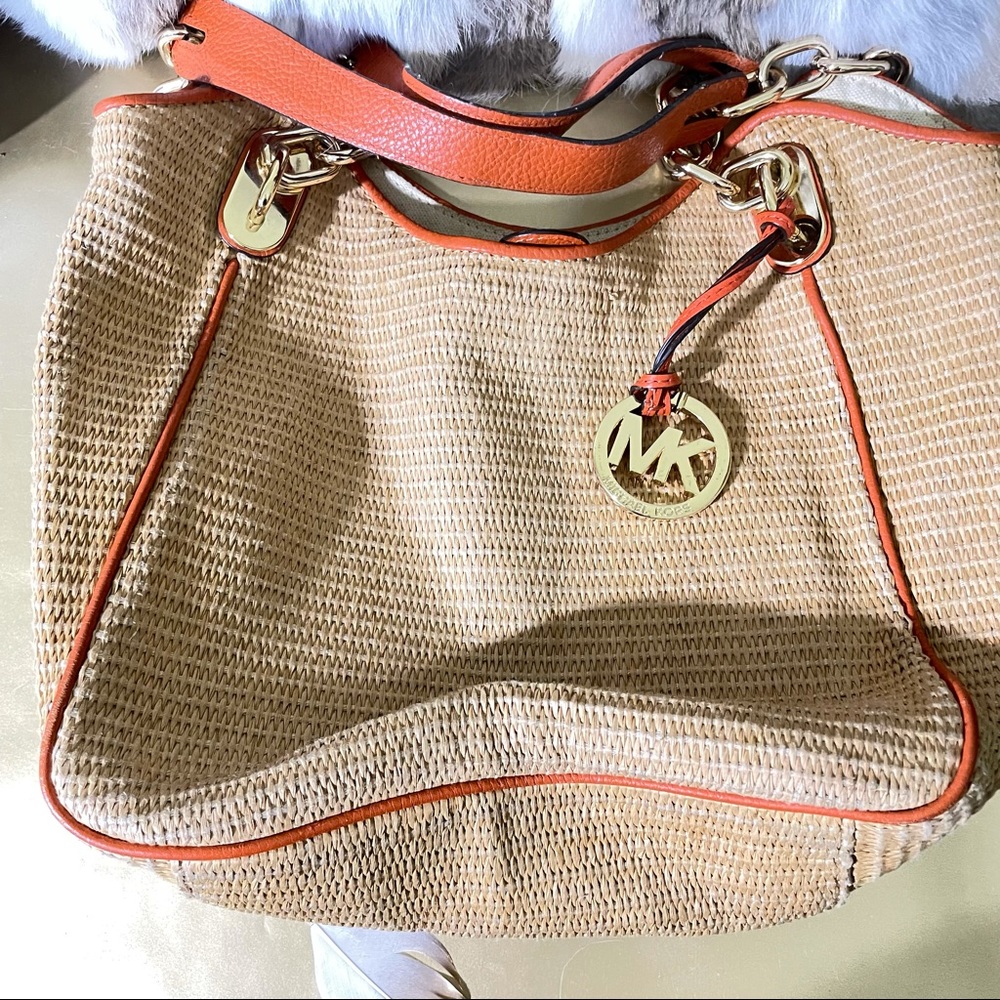 Michael Kors Straw rope style bag with orange.
